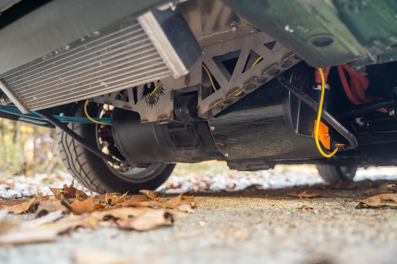 Skudak EV drivetrain — electric motor, battery, and HV wiring